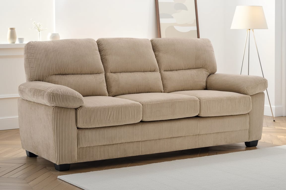 beige jumbo cord 3 seater sofa with deep channels in a living room