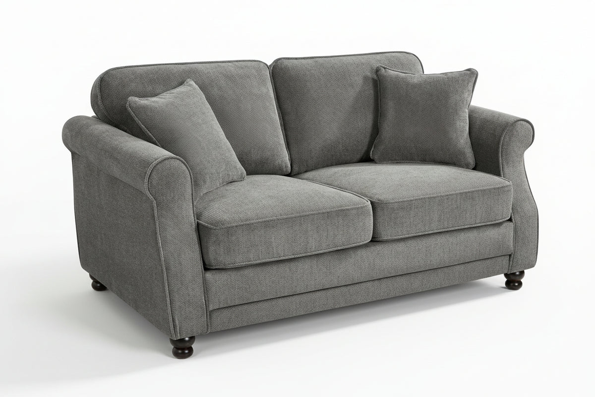 Dark grey chenille 2 seater sofa with accent cushions and wooden legs on a white background