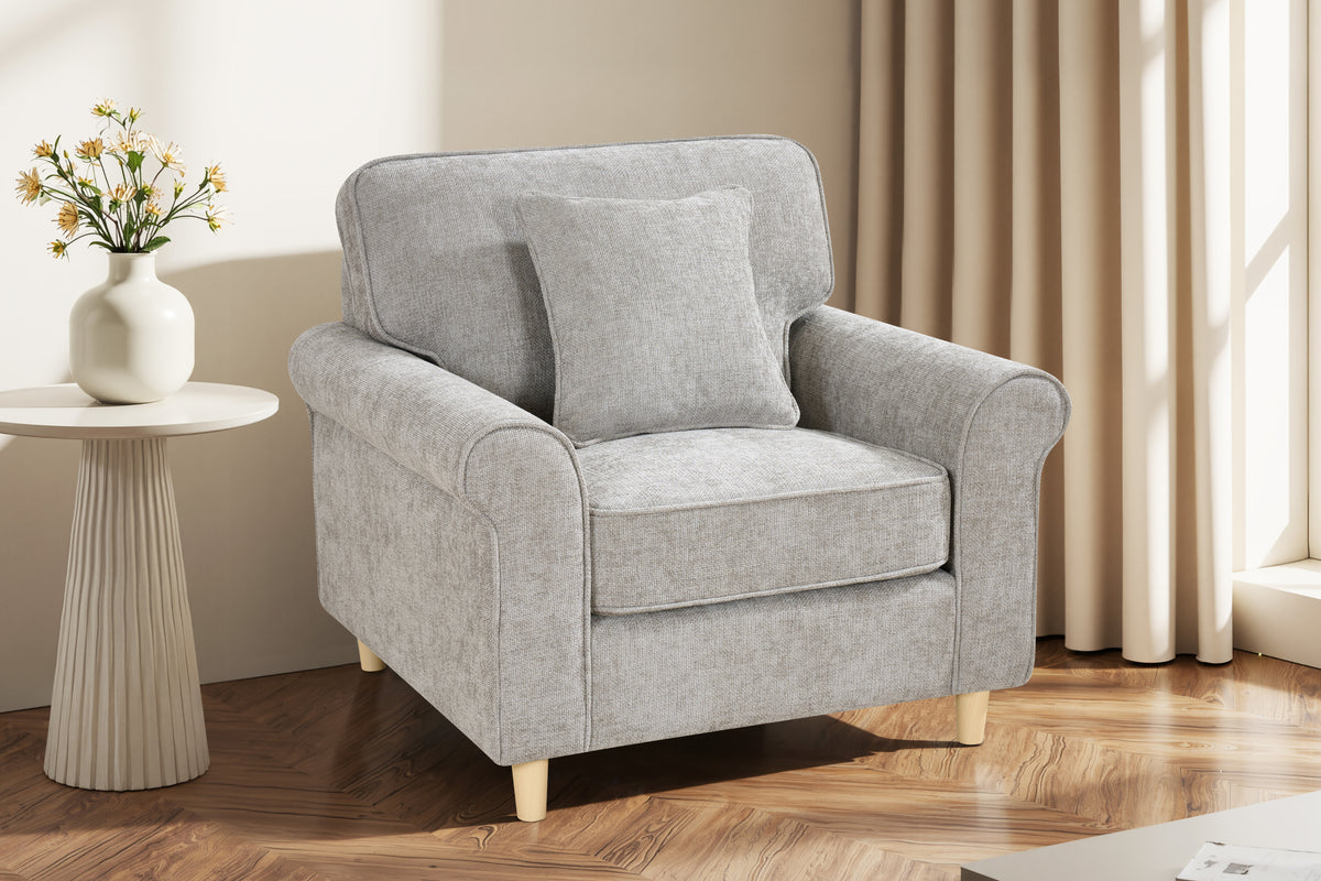 grey chenille fabric 1 seater sofa with a matching accent cushion in a living room