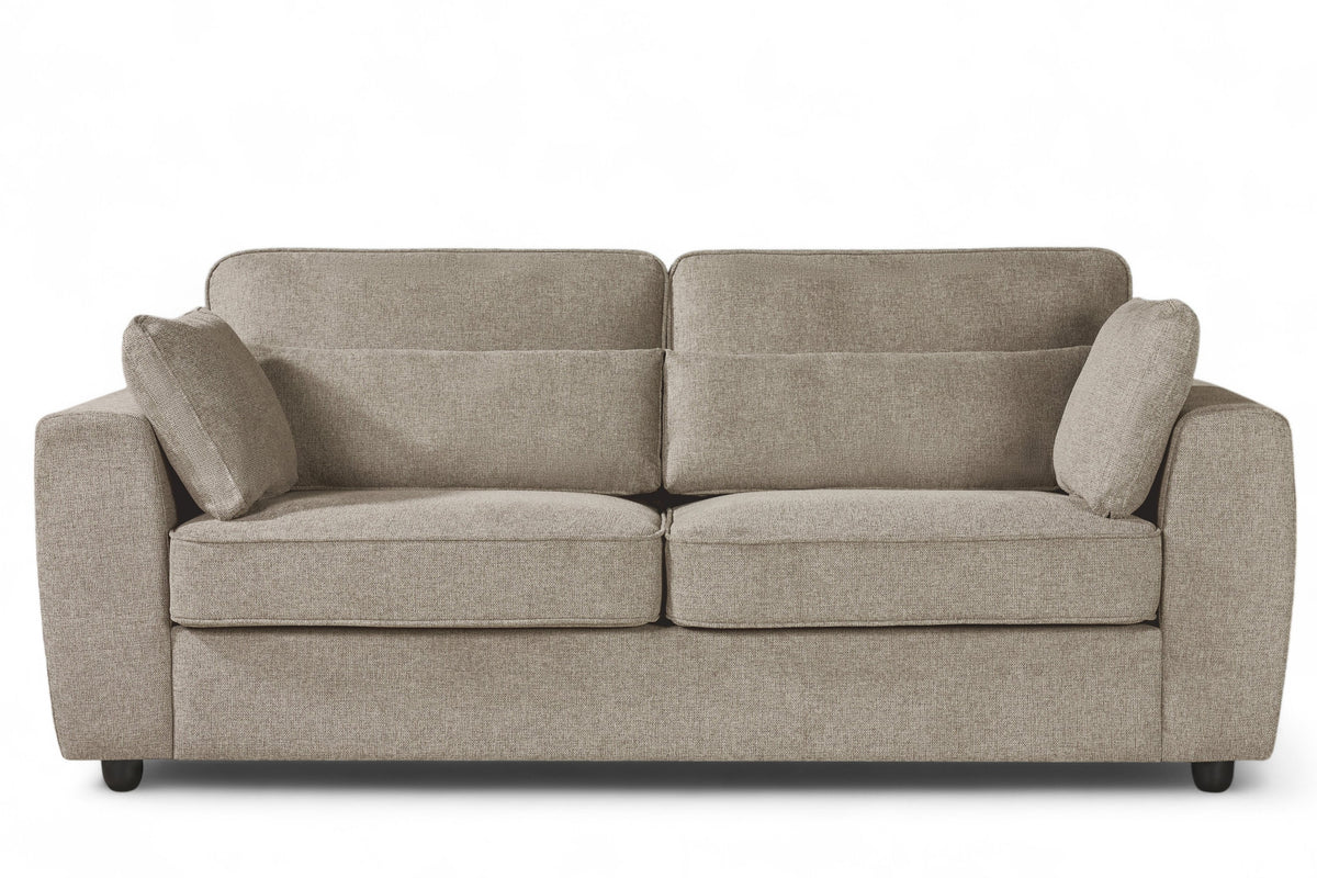 beige 3 seater sofa upholstered in soft beige chenille fabric with fixed back cushions and additional accent cushions