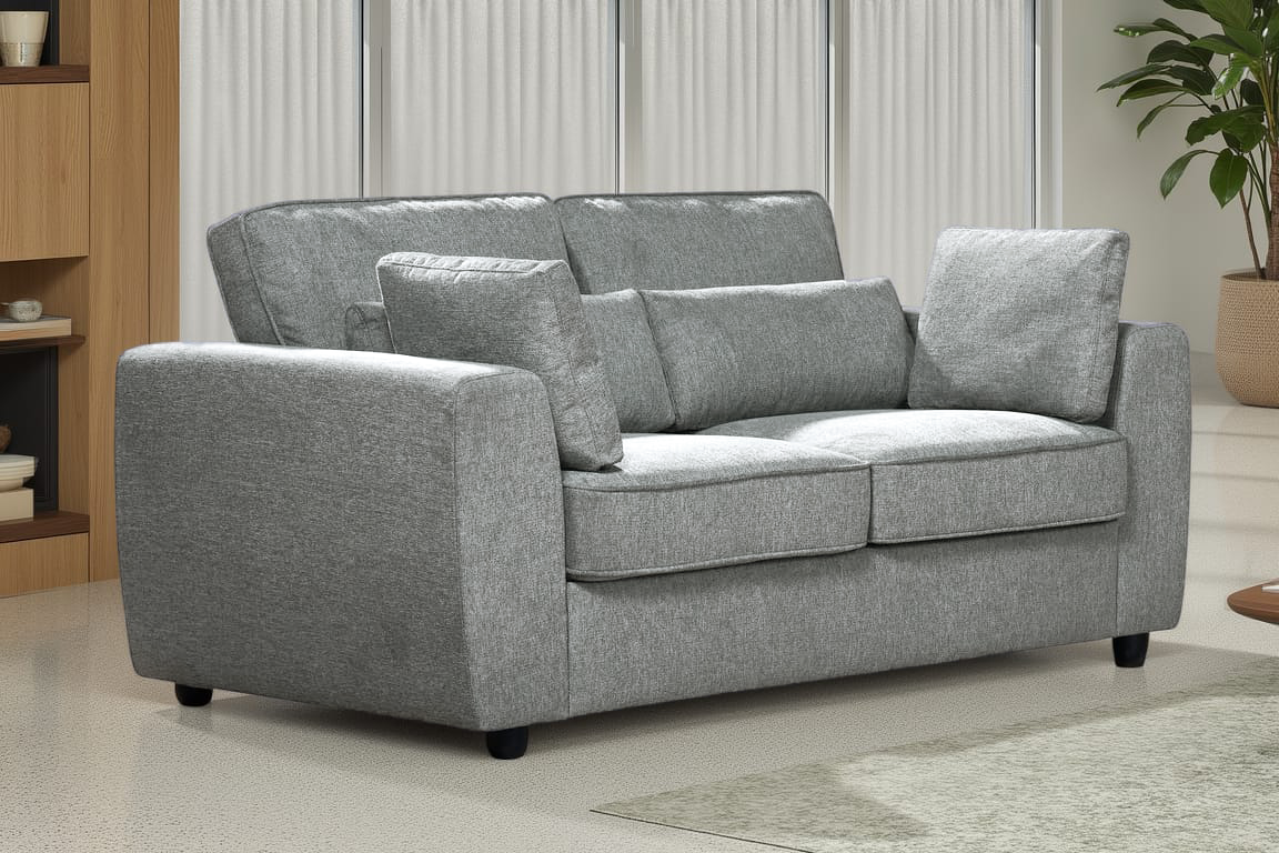 dark grey 2 seater sofa upholstered in soft dark grey chenille fabric with fixed back cushions and additional accent cushions in a living room setting