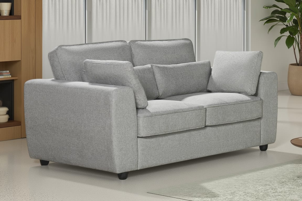 light grey 2 seater sofa upholstered in soft light grey chenille fabric with fixed back cushions and additional accent cushions in a living room setting