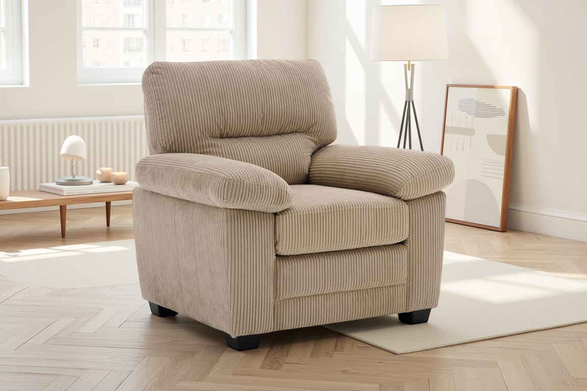 beige jumbo cord 1 seater sofa in a living room