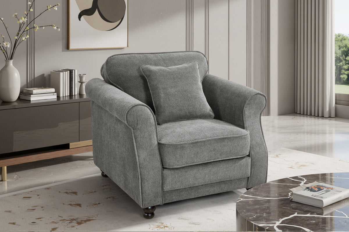 Dark grey chenille 1 seater sofa with an accent cushion and wooden legs in a living room