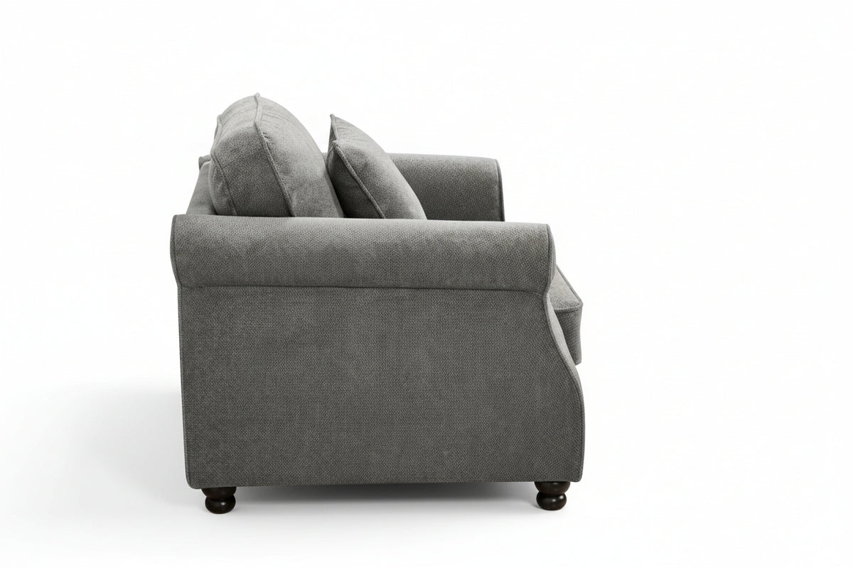 Dark grey chenille 1 seater sofa with an accent cushion and wooden legs on a white background