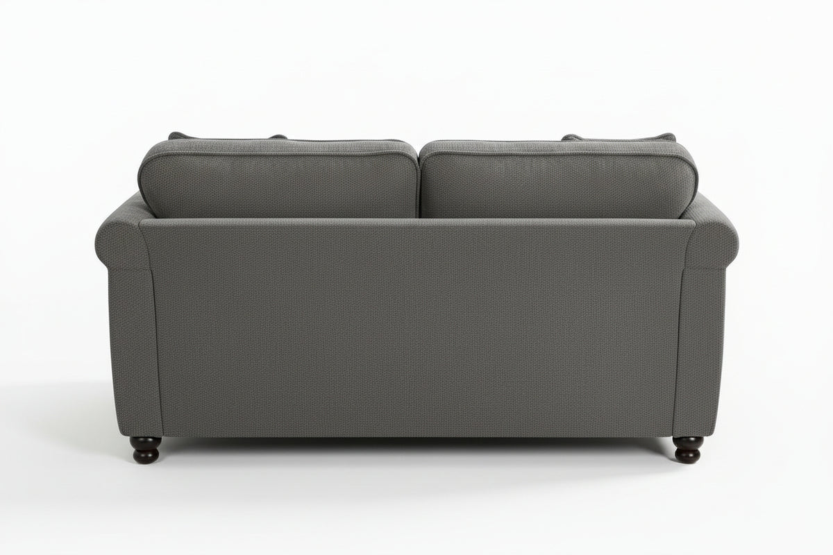 Dark grey chenille 2 seater sofa with accent cushions and wooden legs on a white background