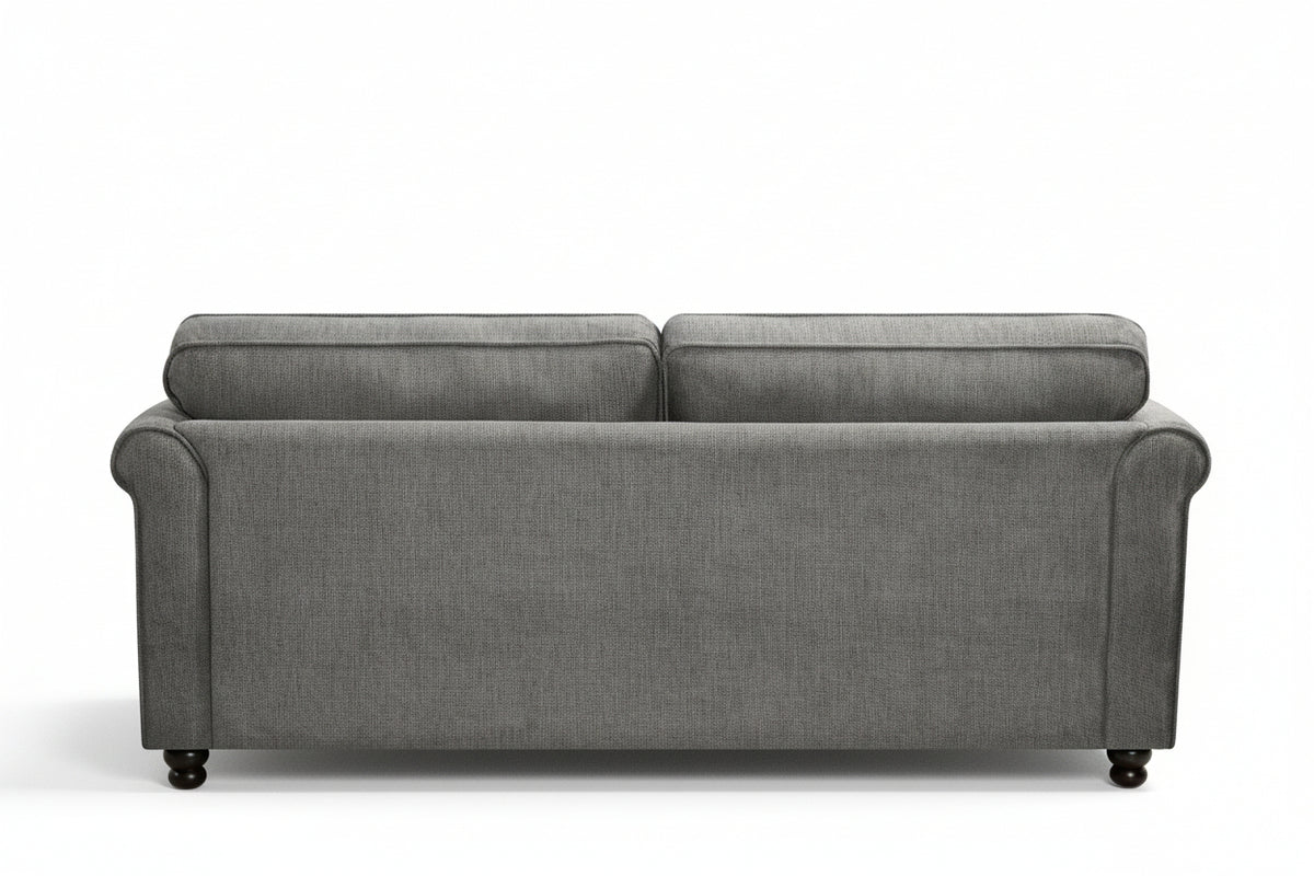 Dark grey chenille 3 seater sofa with accent cushions and wooden legs on a white background