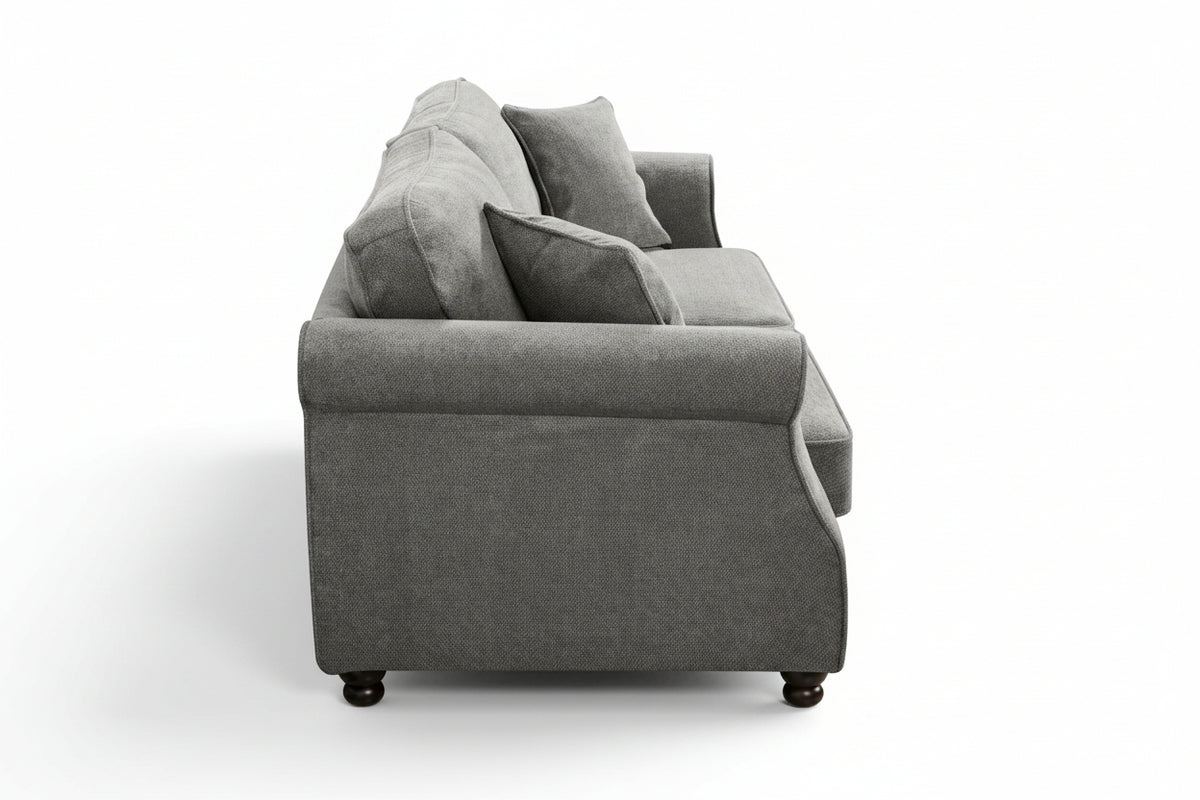 Dark grey chenille 3 seater sofa with accent cushions and wooden legs on a white background