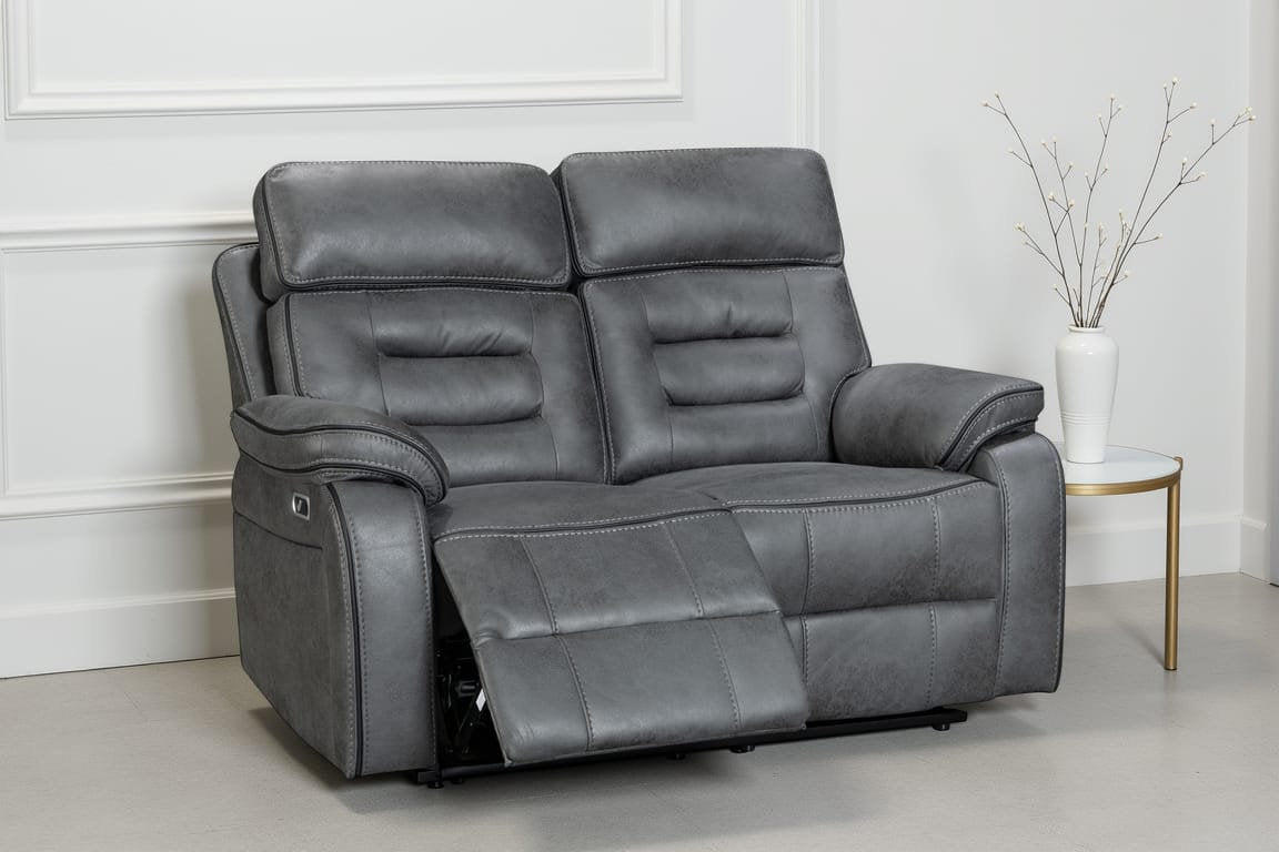 faux leather grey electric 2 seater recliner sofa in a living room