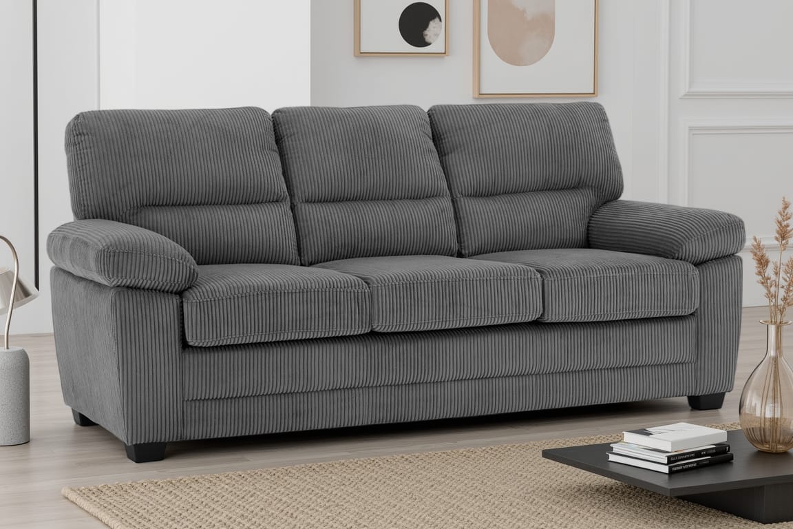 grey jumbo cord 3 seater sofa with deep channels in a living romm