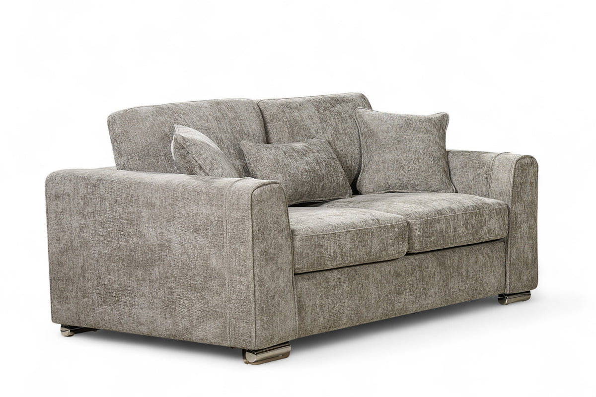 Grey chenille 2 seater sofa with matching cushions on a white background