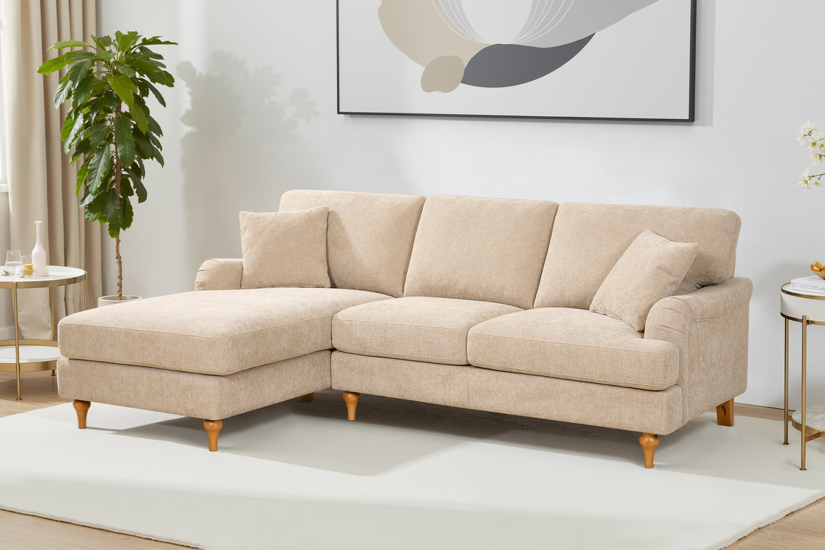 l-shaped sofa in modern style upholstered in beige textured chenille with left hand facing chaise section
